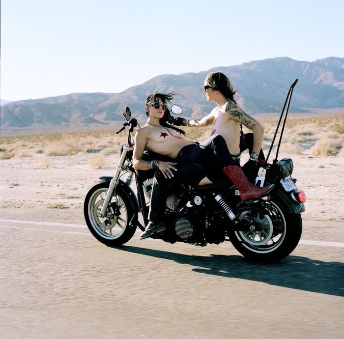 Girls on a motorcycle in Jugao